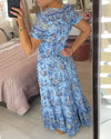👗 Rochie cu imprimeu floral și decolteu ascuțit