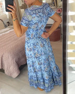 👗 Rochie cu imprimeu floral și decolteu ascuțit