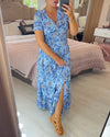 👗 Rochie cu imprimeu floral și decolteu ascuțit