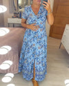 👗 Rochie cu imprimeu floral și decolteu ascuțit