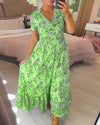 👗 Rochie cu imprimeu floral și decolteu ascuțit